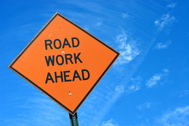 A road work ahead sign